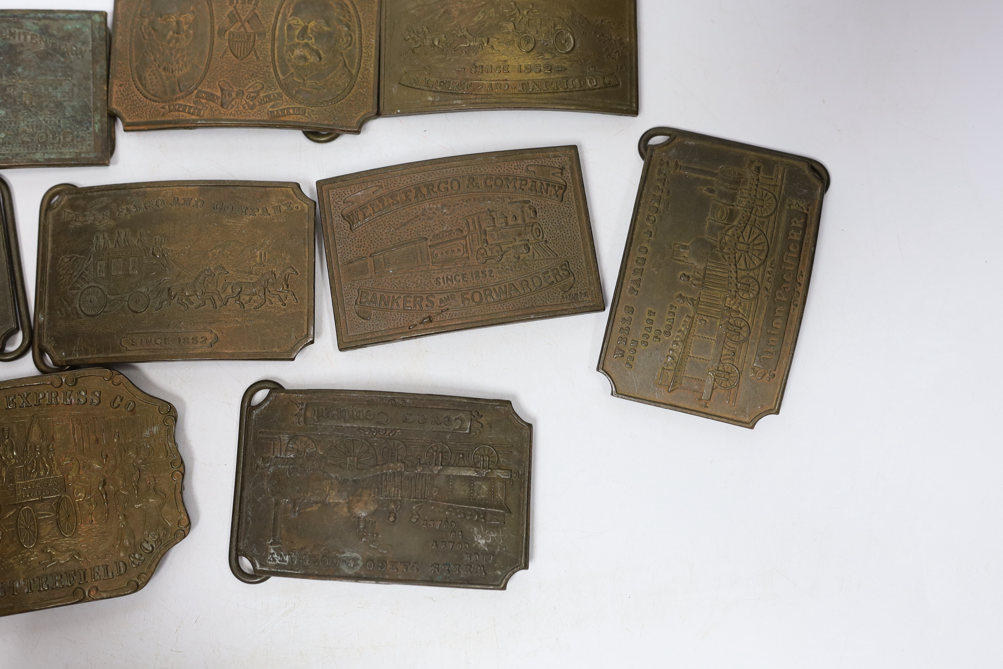 A collection of Wells Fargo and similar belt buckles, mostly by Tiffany & Co.